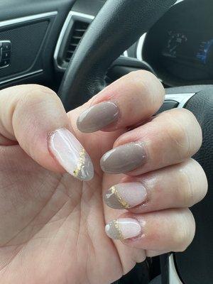 Dip manicure with tips and nail art.