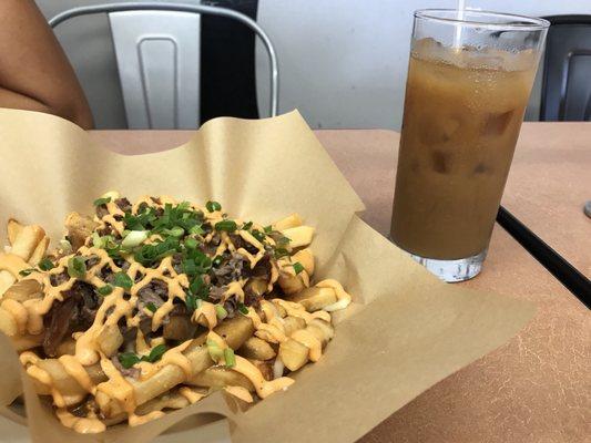 Kalua pork poutine fries and cold brew coffee