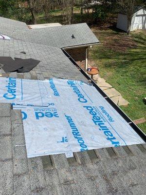 Roof repair underway on a home in Atlanta, GA.