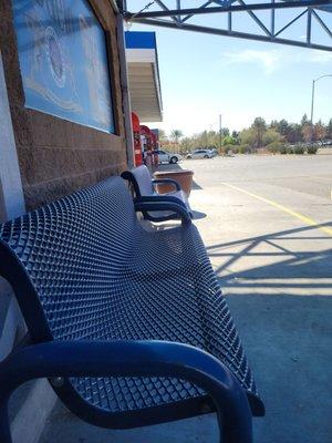 Outdoor benches in the shade