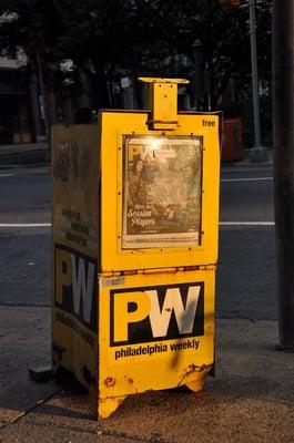 a typical yellow pw box. note the orange citypaper box in the background. they're usually right near each other.