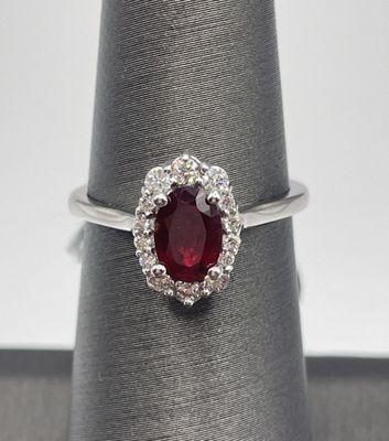 Ruby and diamond rings set in 14 karat white gold