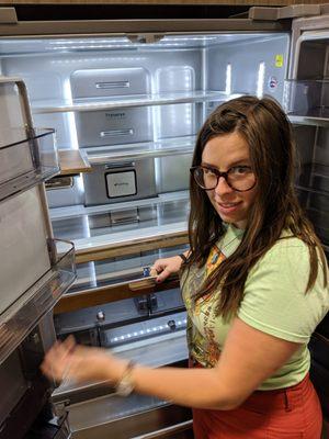 The fridge to end-all fridges! There was wood paneling in it. Just a measly 4,000 dollars