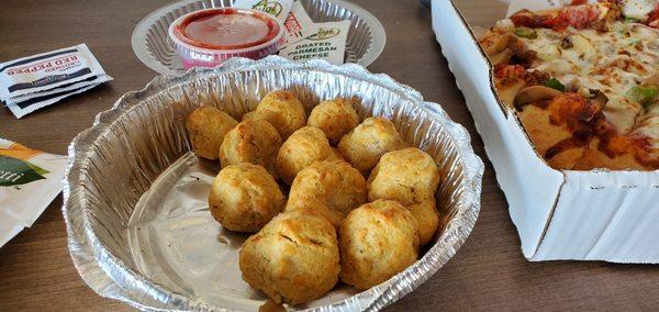 Breaded mushrooms with a side of pizza sauce