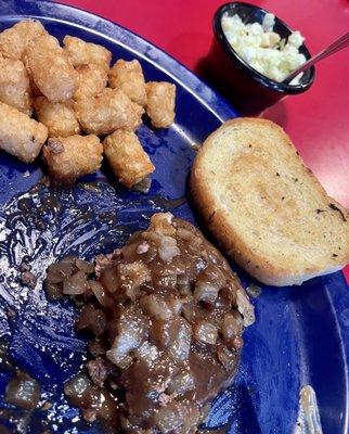 Chopped steak with brown onion gravy, tater tots, coleslaw, toast