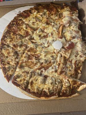 Our pizza looked like it was dropped and still given to us.