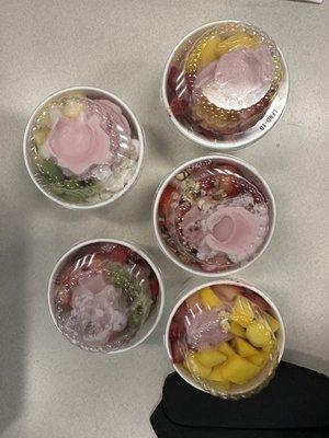 Yogurts with incorrect toppings and the wrong flavored yogurt