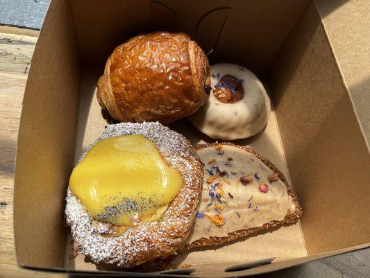 Chocolate croissant, peach cornmeal olive oil cake, peach hand pie, lemon cheese danish.