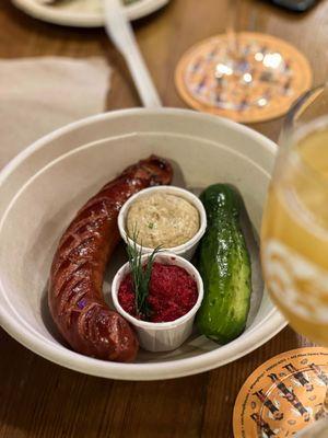 Side of Kiełbasa with a Polish pickle, mustard and horseradish beets