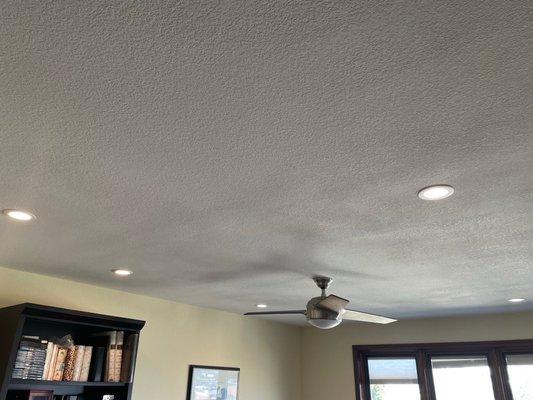 Recessed ceiling lights and patch work on ceiling.