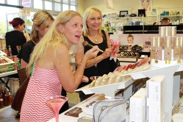 Planet Beauty customers enjoying our store event.