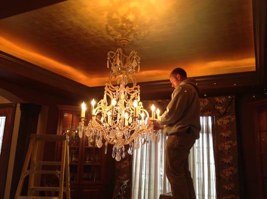 Installation of a new chandelier and new LED cove lighting that replaced some no longer functioning rope lighting at a home in Naperville