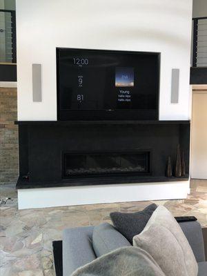 TV Mounted into Custom Fireplace Recess. 85" TV with 5.1 Surround System