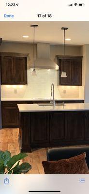 He put in a new hood backsplash and fixed our cabinets to match the old ones. He did a fantastic job.