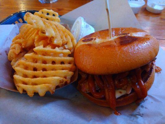 Peanut Butter Pulled Pork, bacon, grilled onions (held), topped with peanut butter BBQ sauce and garlic aioli on the bottom.