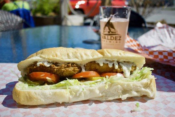 Booty Biter -Halibut Po Boy on a nice warm day on the patio!