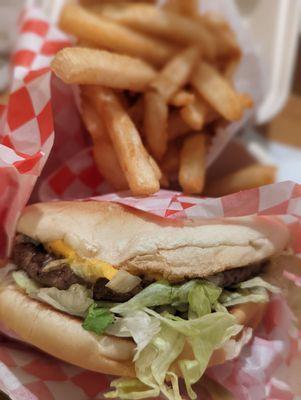 Regular cheeseburger with American cheese and a large fry. Delicious!