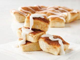 Cinna Square - Fresh baked & buttery pastry - topped with cinnamon sugar. Complete with a side of vanilla icing.