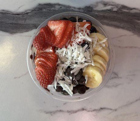 Classic Bowl: açaí, granola, banana, blueberries, strawberries, coconut, agave.