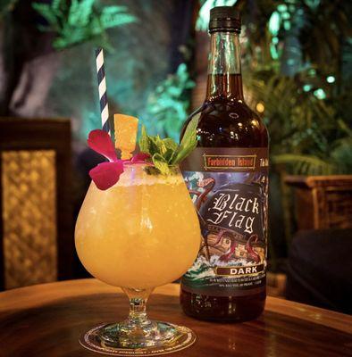 Our signature cocktail, Forbidden Island, using our private label Dark Rum