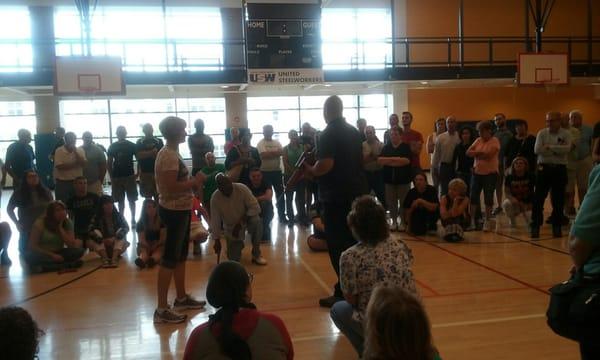 Demonstrating disarming active shooter with a student. We had actual practice with pseudo firearms.