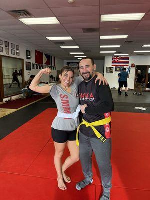 Had the honor of earning my first ever white belt! Here I am with Coach Gary who led our belt testing.