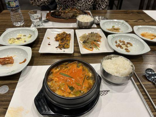 Seafood soup, bulgogi and side dishes.