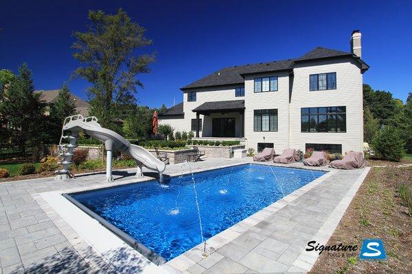 Signature Pool in Warrenville, IL.  This Signature Fiberglass Pool is 33' x 16' and is called the Zenith.