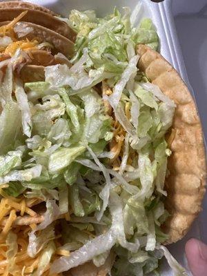 Lettuce literally thrown into the plate- not into the taco itself.