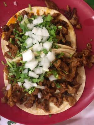 Tacos al pastor (marinated pork with pineapple tacos)