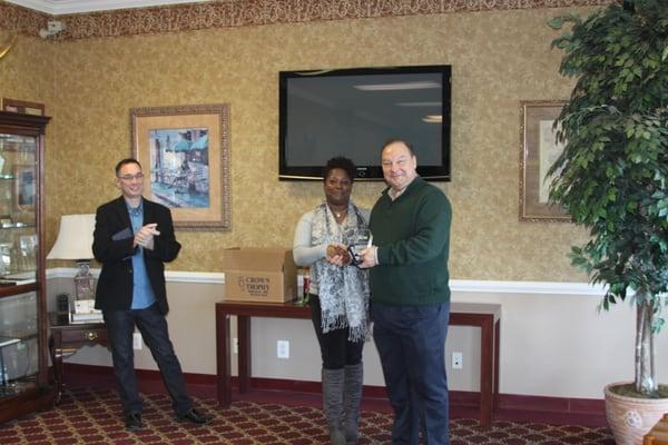 Christina Moody recognized for her outstanding customer service & contribution in 2014. Pictured (left to right) Steve Nichol...