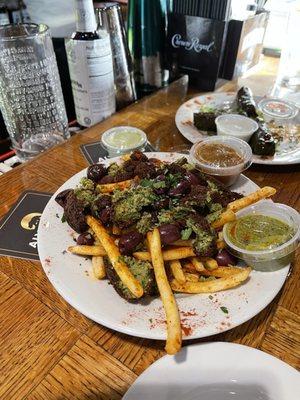 Falafel fries with all the awesome sauces!