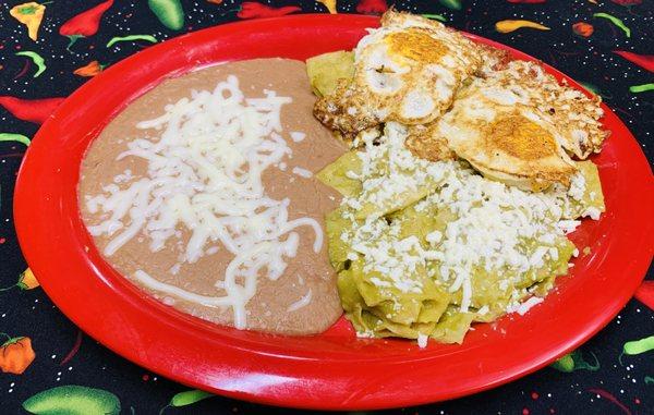 Chilaquiles- Sautéed corn tortillas with your choice of red or green salsa topped with queso fresco and sour cream. Serve with two eggs.