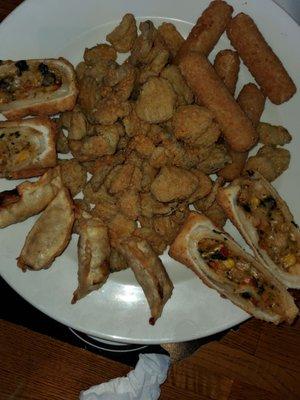 The 4-Sampler...Pot stickers, Mozzarella Sticks, Southwest EggRolls, Fried Pickles