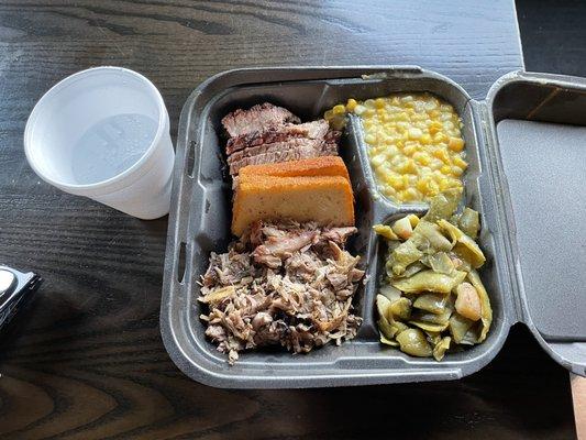 Two Combo Platter $23 (pictured: brisket and pork shoulder w/ smoky beans and corn) 9/2022.