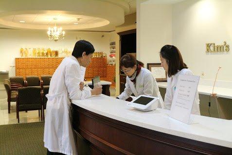 Dr. Kim and the staff getting ready for the patients