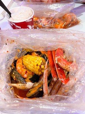 Combo 2: 1/2 shrimp, mussels, crab. Comes with corn and potato