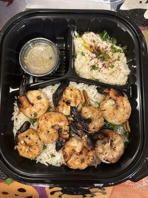 Shrimp kebabs with rice and babaganouj