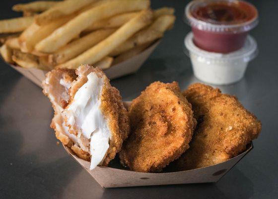 Grilled Halibut & Fries with tartar and cocktail sauce for dipping