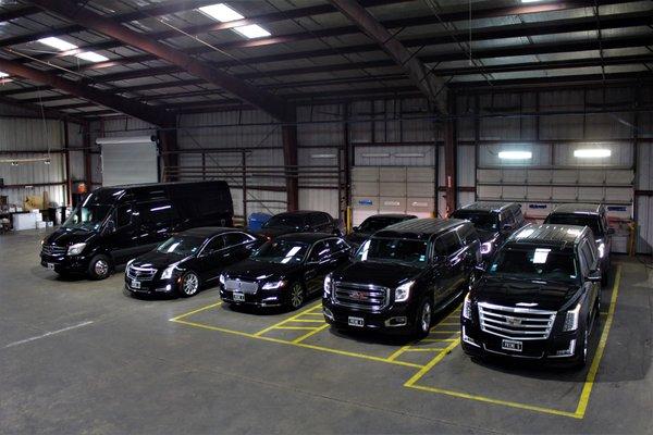 Garage with Luxury Sedans and SUVs