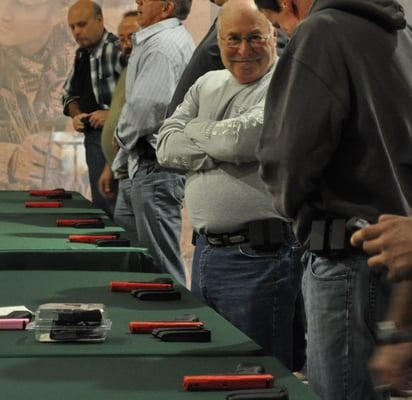 Happy students at Top Shot Academy using SIRT Training Pistols and Blade-Tech Holsters.