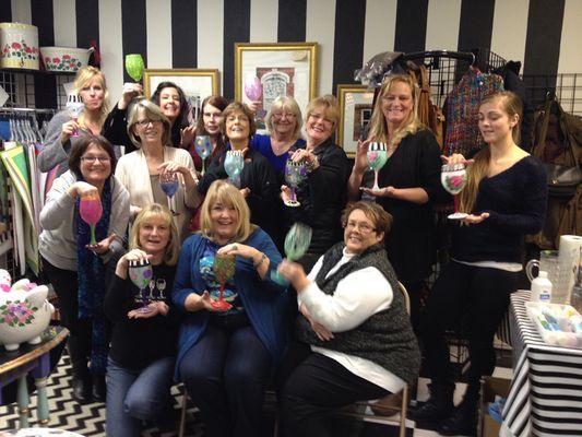 Wine glass painting party end results. Happy group.