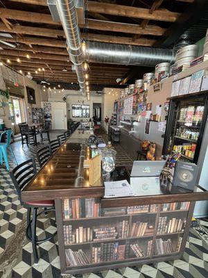 The long extended bar for many beer tasters ready for a unique FLIGHT sampling of your choice!