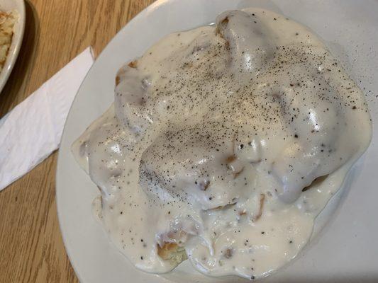 Biscuits and gravy. You can see how overcooked the biscuits are.