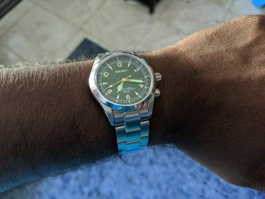 Normally this watch comes on a leather strap, but the bracelet is custom.