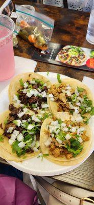 Two chicken and two asada tacos con todo