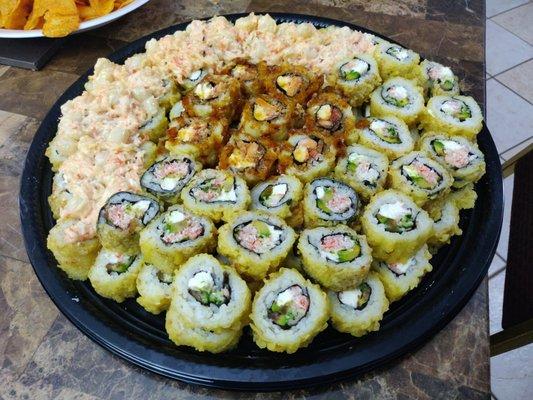 Party tray filled with sushi of you choice. super affordable and CONVINIENT! give your party the life it's been waiting for!