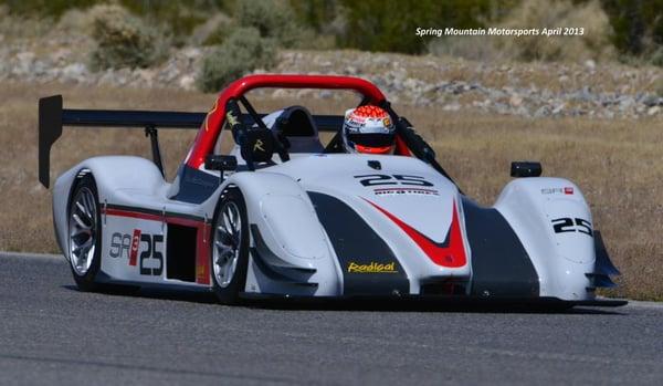 Tim - owner of Big O Tires Anaheim racing at Spring Mountain in his Radical SR3RS