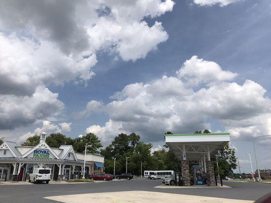 Second line of gas pumps and storefront.