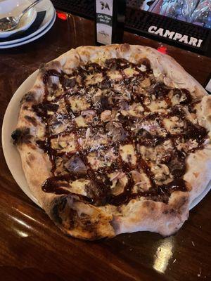 Beef marsala pizza... I added red pepper flakes and Parmesan